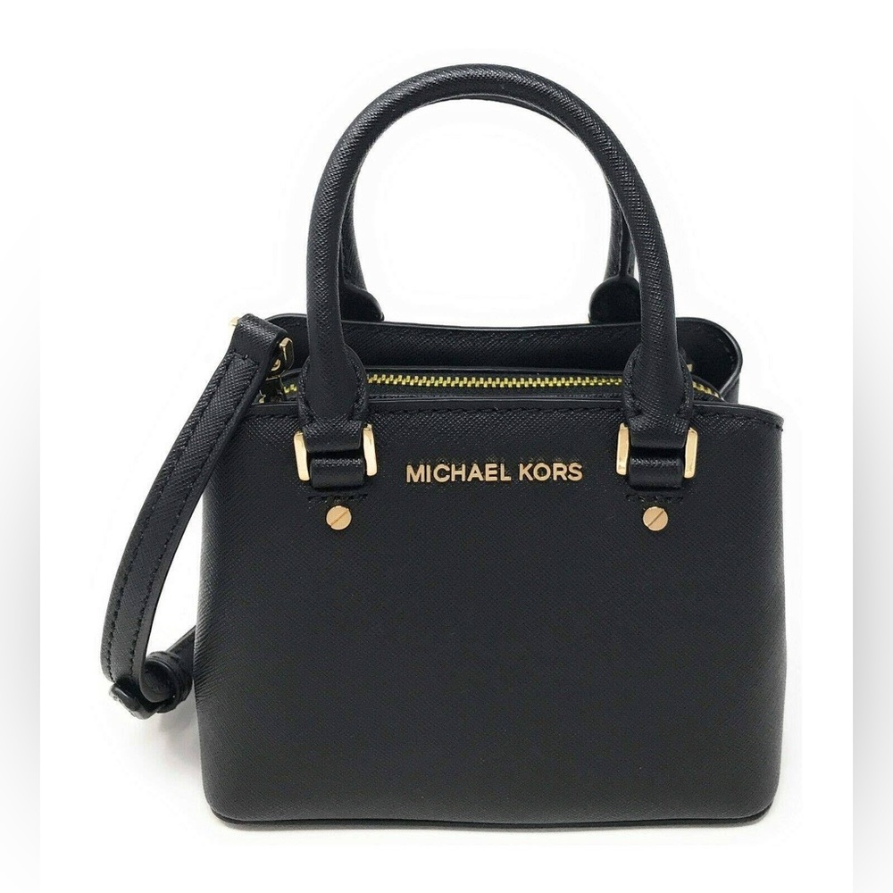 Women’s Michael kors mini satchel purse.